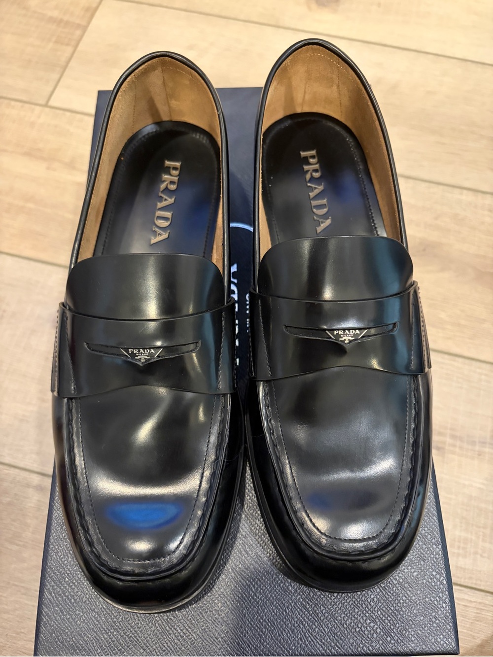 Prada Black Leather Penny Loafers with Metal Logo